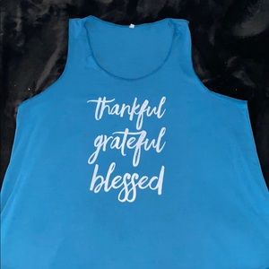 A-line teal tank top in size XL.